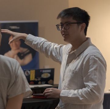 Ryan Wong coaching at a session